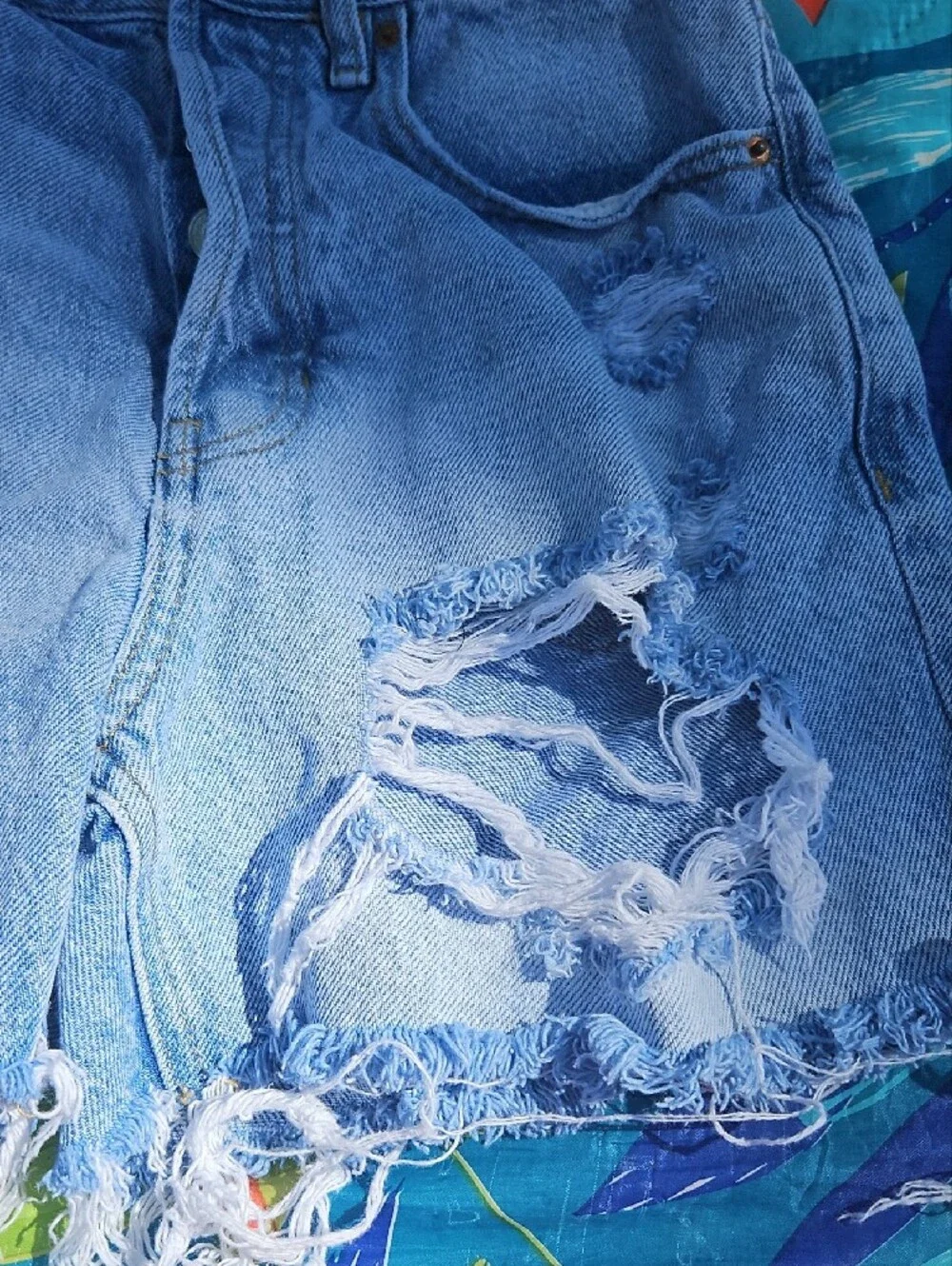 Women's Light Blue Distressed Denim Shorts